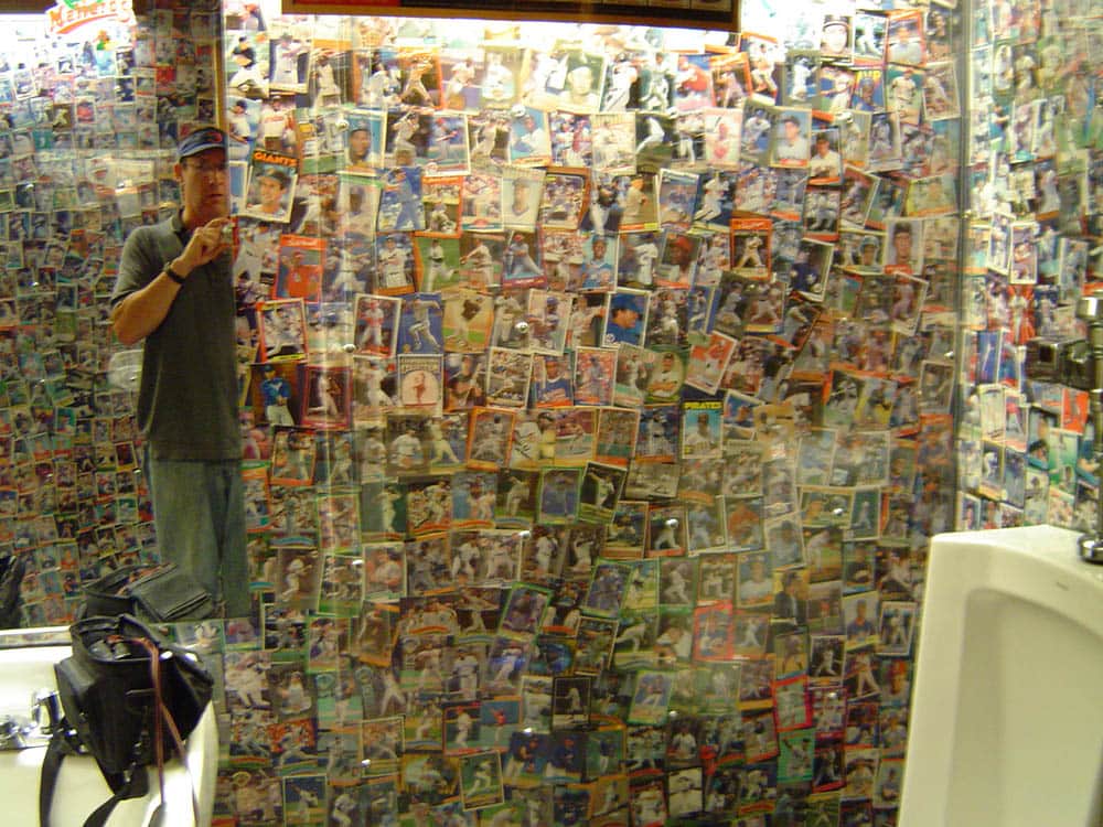 Little Cubs Field Bathroom with players cards on the wall.